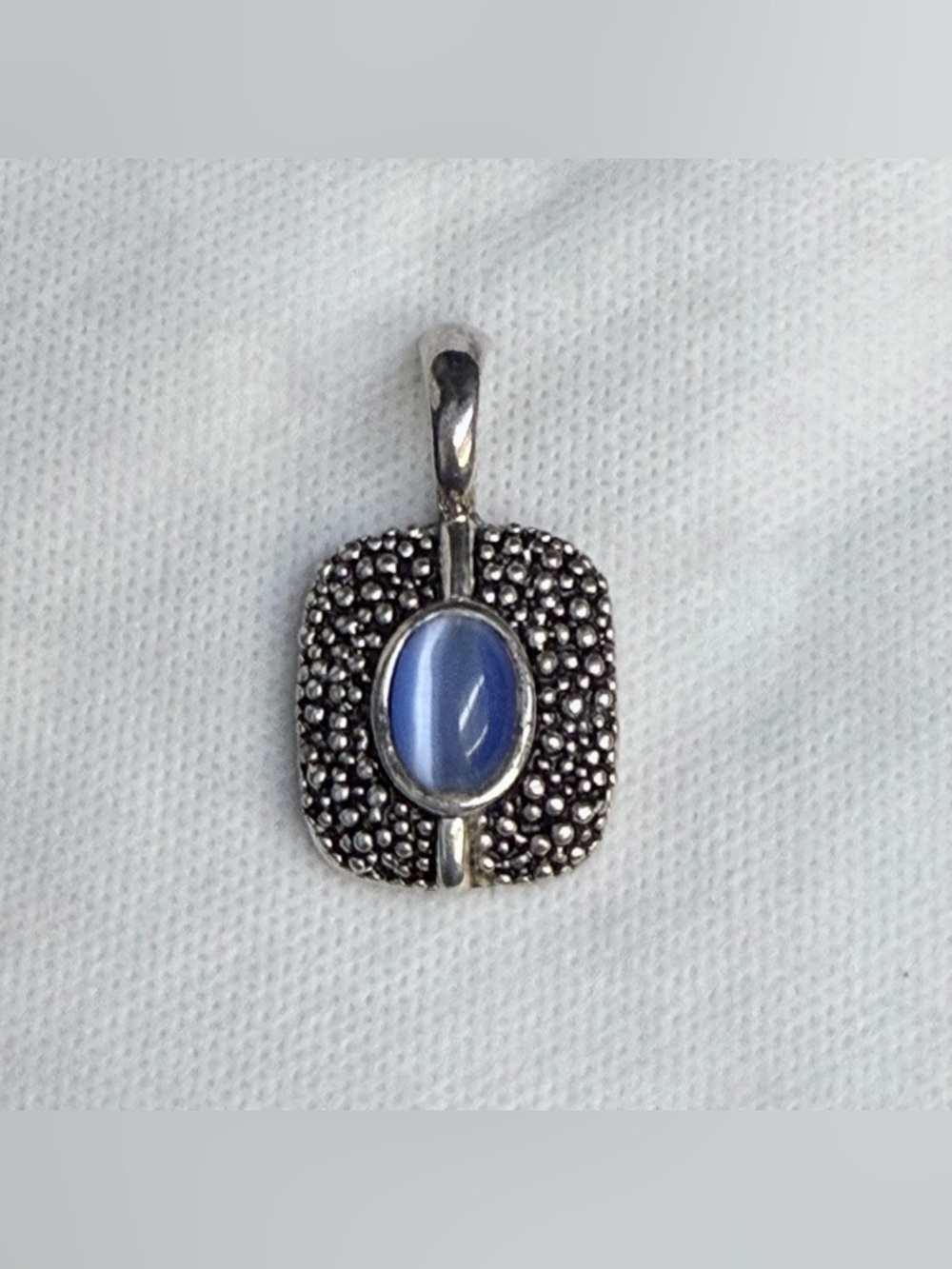 Premier Designs silver and blue cats eye pendant